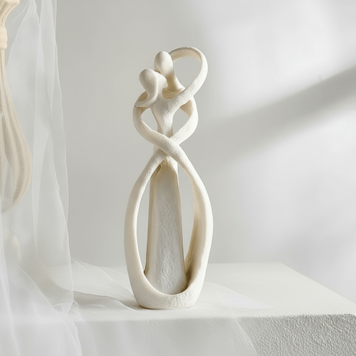 Abstract resin sculpture in a beige or white finish, hero view.