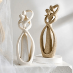 Abstract resin sculpture in a beige or white finish, product detail 1.