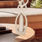 Abstract resin sculpture in a beige or white finish, product detail 5.