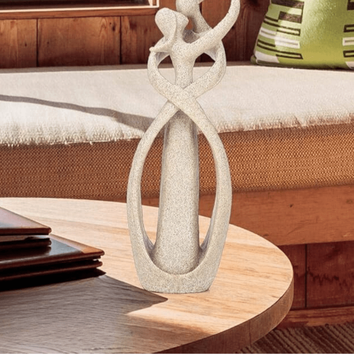 Abstract resin sculpture in a beige or white finish, product detail 5.