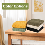 Folded textured acrylic knit throw blankets showing available colors