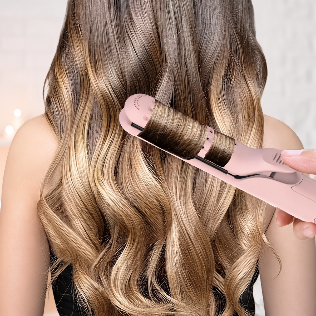 Pink airflow styler used around the original hair section