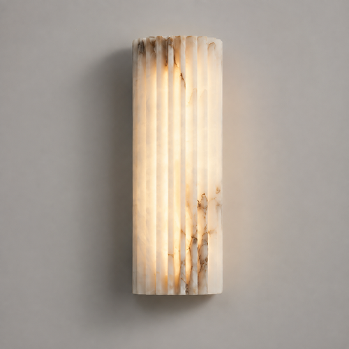 Vertical wall sconce with a softly glowing textured shade mounted on a light gray wall.