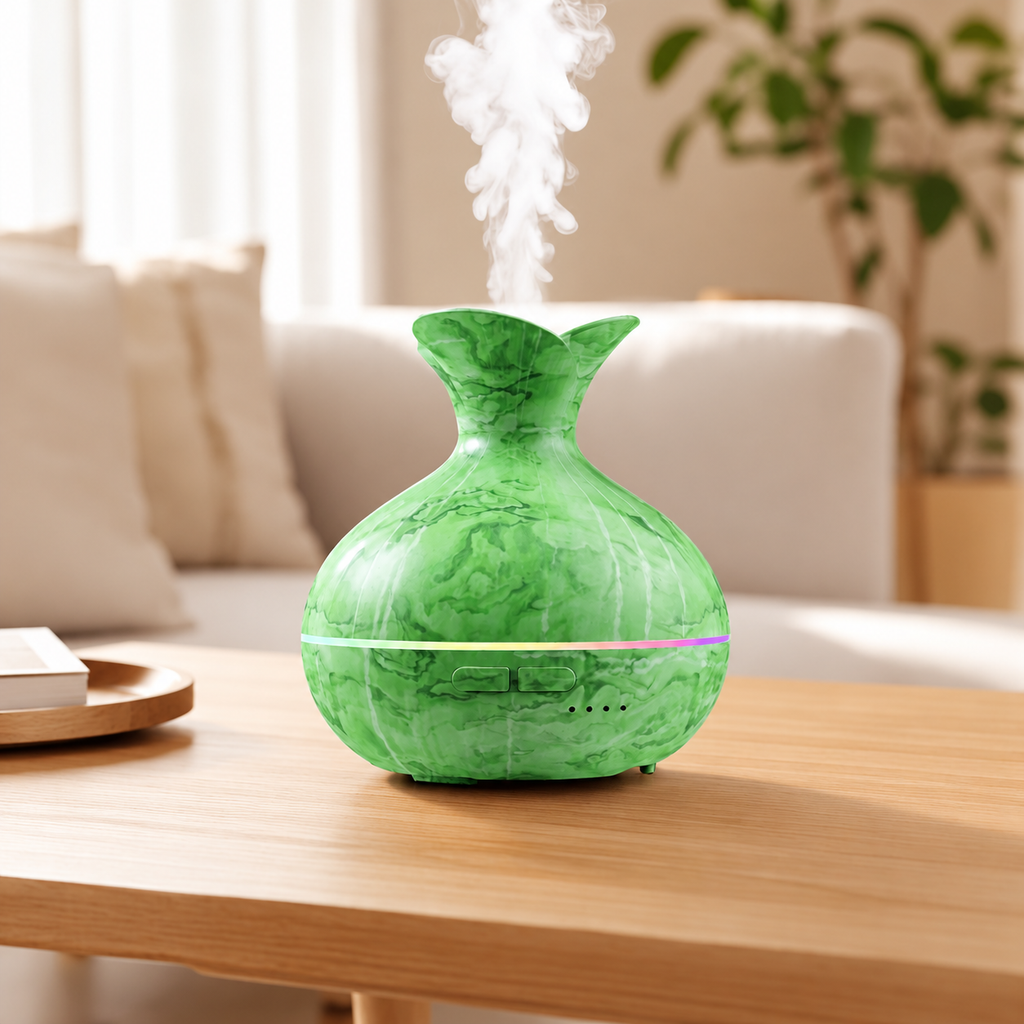 Marbled green aroma diffuser with a flared neck releasing mist on a wooden table