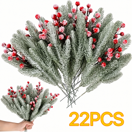 Twenty two artificial cedar and red berry sprigs with a white snow dusted finish