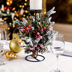 Artificial cedar and berry sprigs styled around a separate candleholder