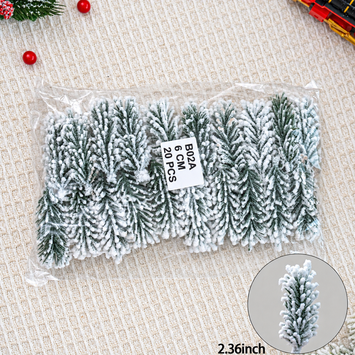 Pack of twenty snow flocked artificial cedar sprigs measuring approximately 2.36 inches