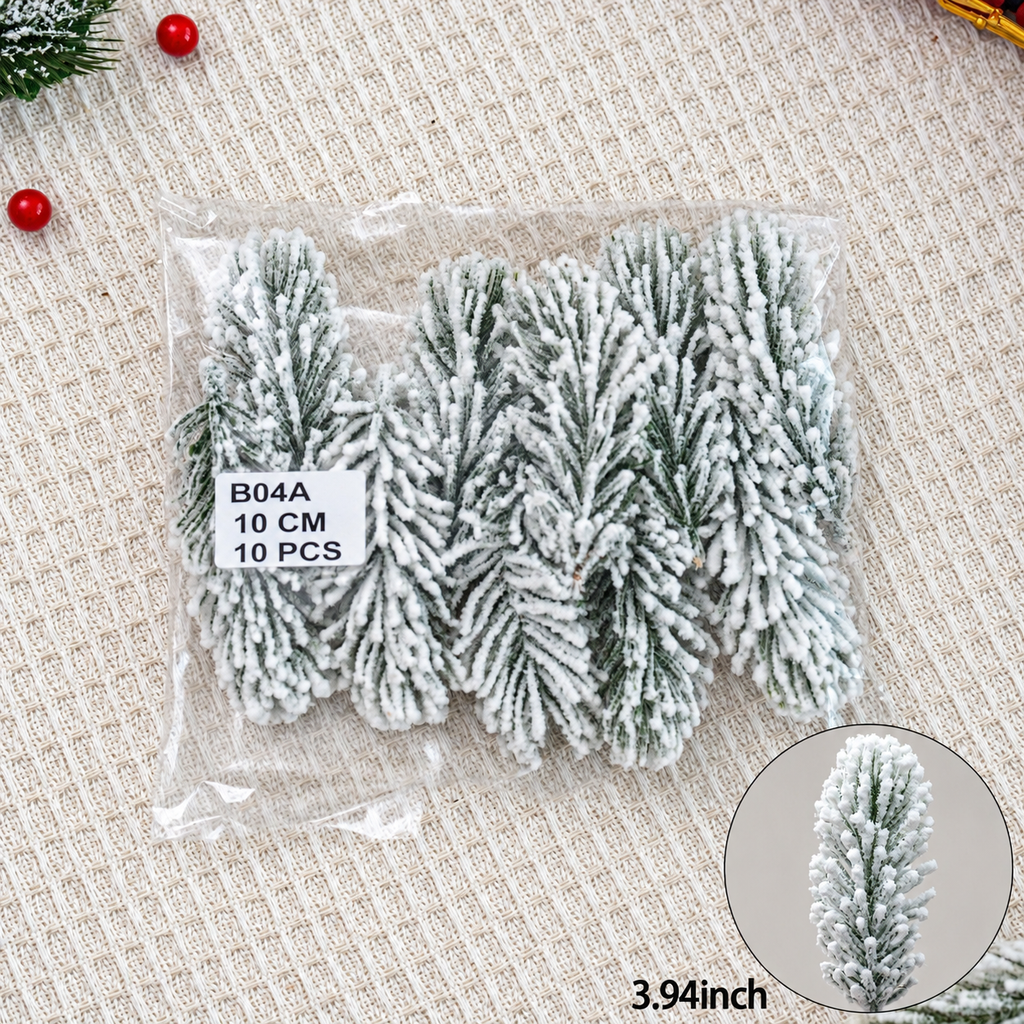Pack of ten snow flocked artificial cedar sprigs measuring approximately 3.94 inches