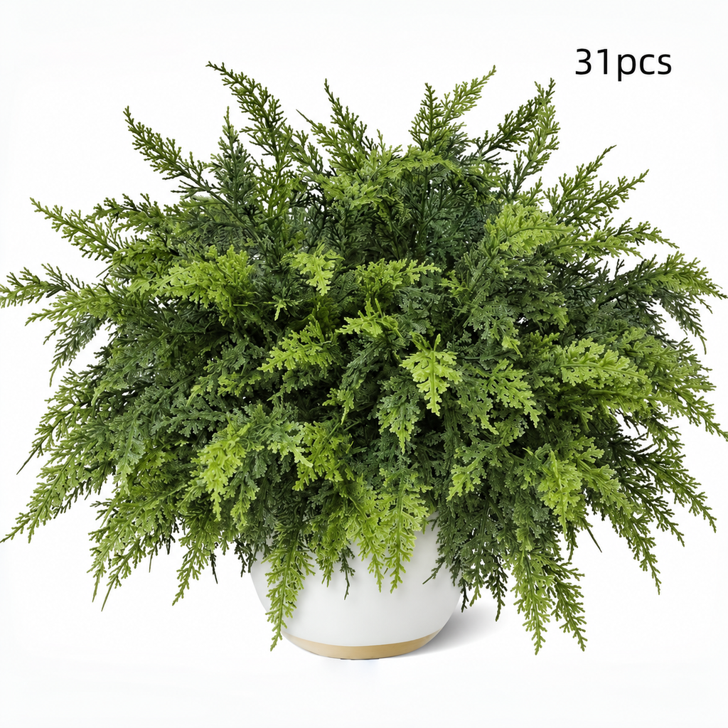 Thirty one artificial cedar sprigs arranged in a separate white vase