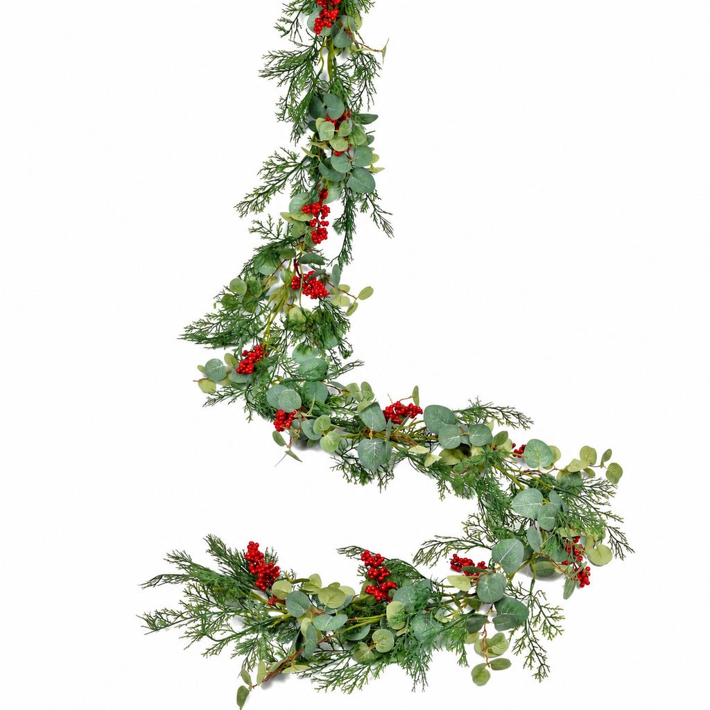 Artificial Christmas garland with green pine and eucalyptus style leaves and red berries.