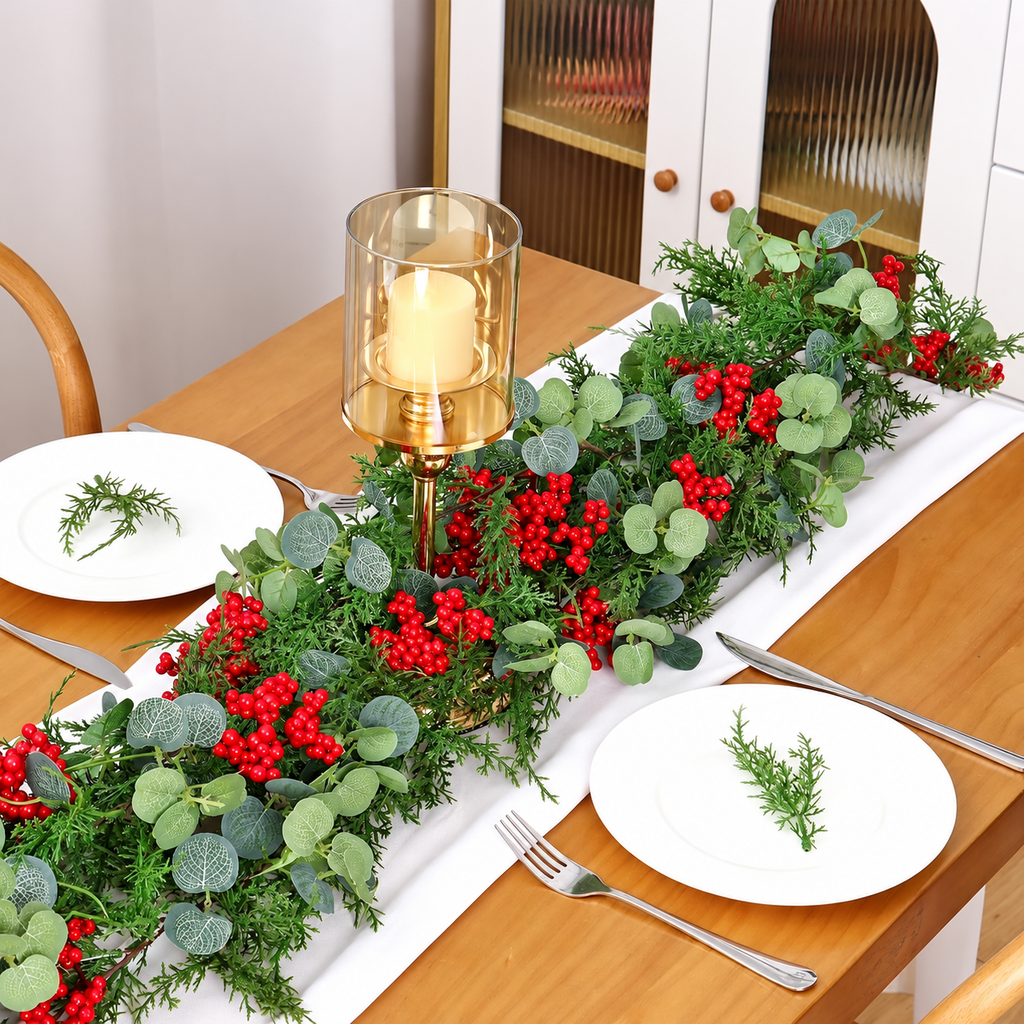 Artificial Christmas garland arranged as a dining table centerpiece.