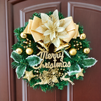Gold bow artificial Christmas wreath hanging on a dark door