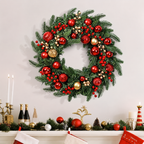 Red and gold artificial Christmas wreath displayed above a decorated mantel