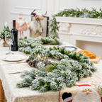 Snow flocked artificial garland styled down a dining table