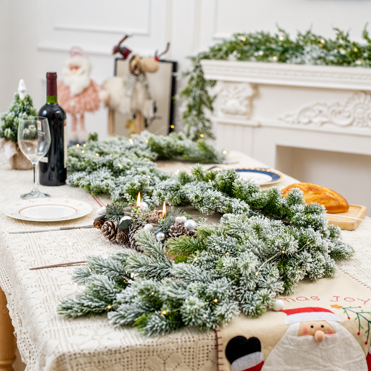 Snow flocked artificial garland styled down a dining table