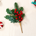 Artificial holly and pine Christmas pick with green leaves red berry details and brown stem