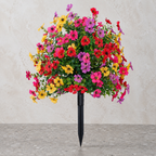 Mixed-color artificial outdoor flowers on limestone and terrazzo surfaces
