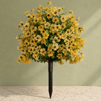 Yellow artificial outdoor flowers against sage canvas and cream terrazzo