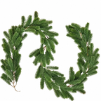 Bare artificial green pine garland curved on a white background