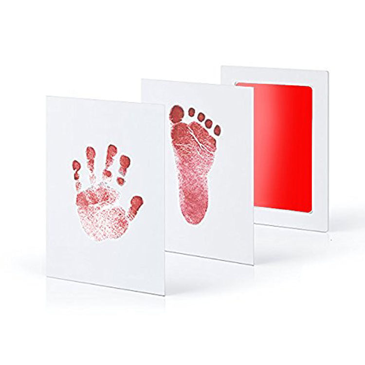 Baby handprint kit in red with matching hand and foot impressions