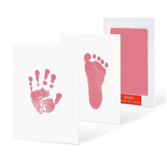 Baby handprint kit in pink with matching hand and foot impressions