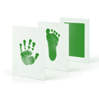 Baby handprint kit in green with matching hand and foot impressions