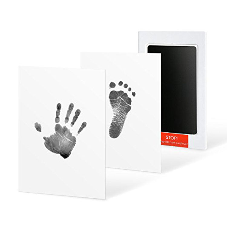 Baby handprint kit in black with matching hand and foot impressions