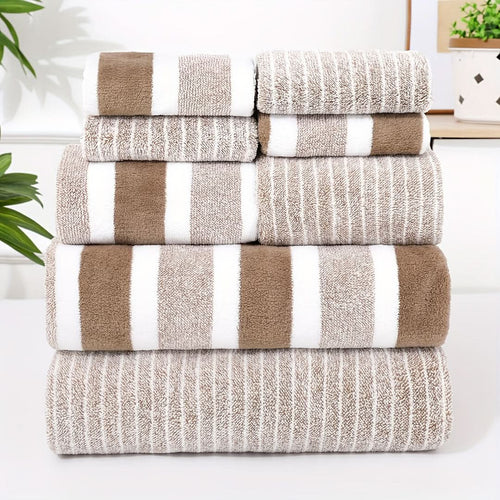 Bath towel set in coffee brown and white stripes stacked in eight coordinated pieces.