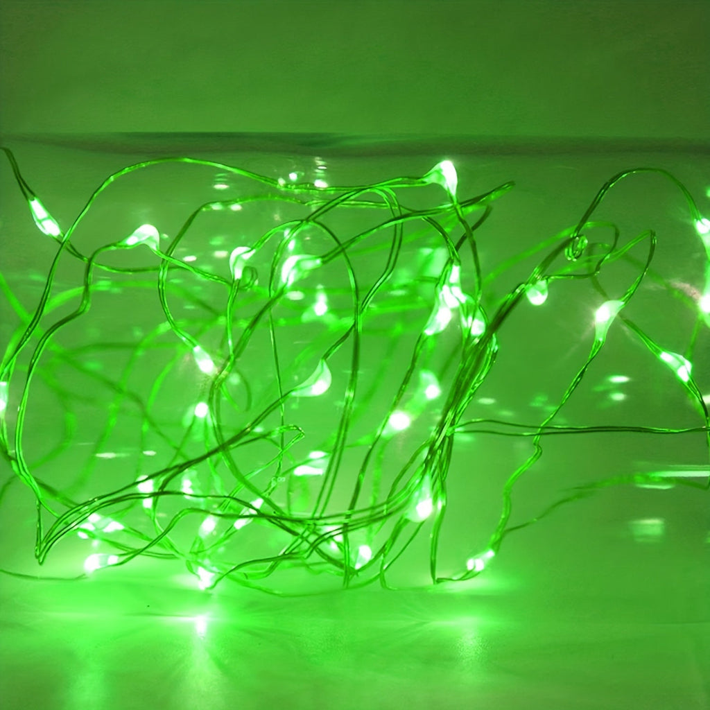 Green fairy string lights illuminated in a decorative strand