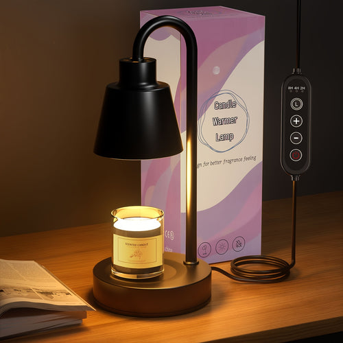 Black candle warmer lamp and jar candle beside its product packaging.
