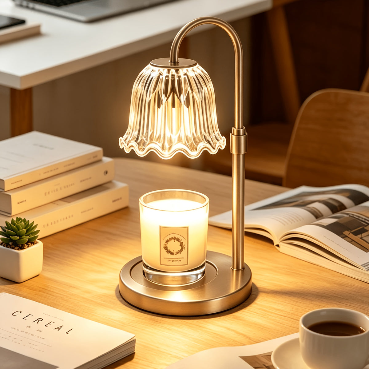 Gold flower shade candle warmer lamp illuminating a jar candle beside books.