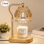 Gold glass candle warmer lamp and jar candle on a wood base, supplier two pack illustration.