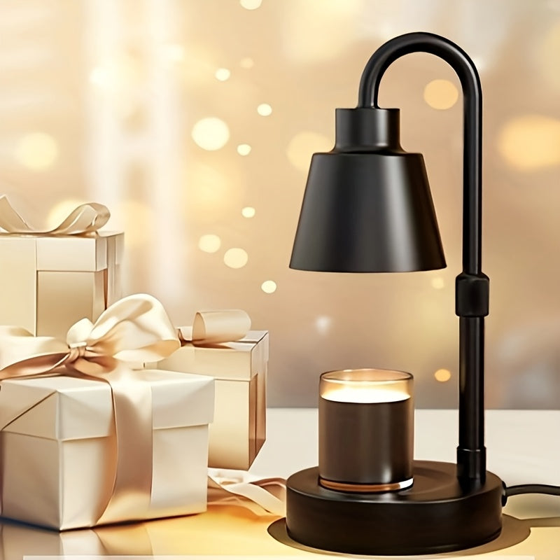 Black candle warmer lamp beside wrapped gifts against a softly lit background.