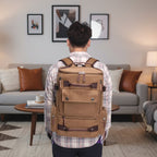Coffee brown canvas backpack displayed indoors