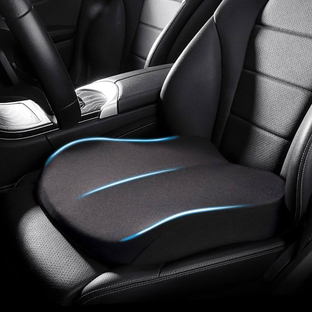 Black tapered memory foam car seat booster cushion installed on a car seat