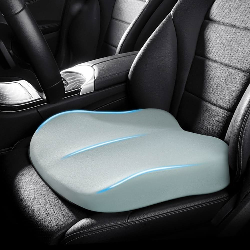 Blue tapered memory foam car seat booster cushion installed on a car seat