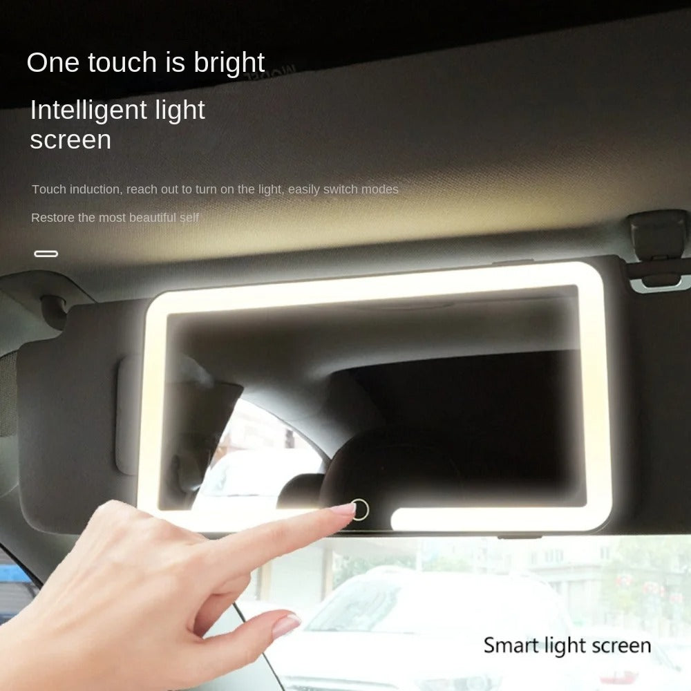 Car visor mirror showing three color lighting