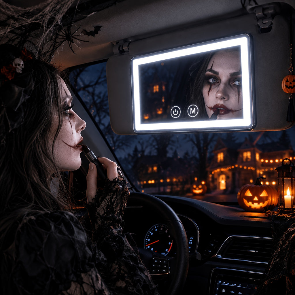 Car visor makeup mirror illuminated in a dark vehicle interior