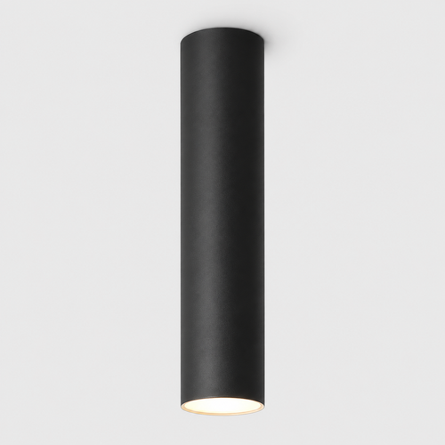 Black ceiling spotlight shown on a light gray background with warm downward illumination.