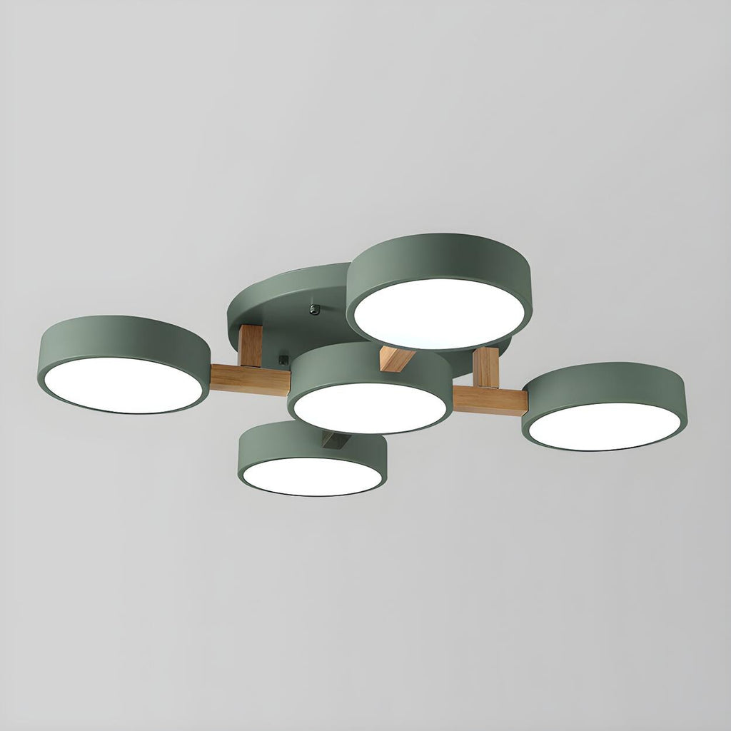 Green ceiling light with five round shades and wood details.