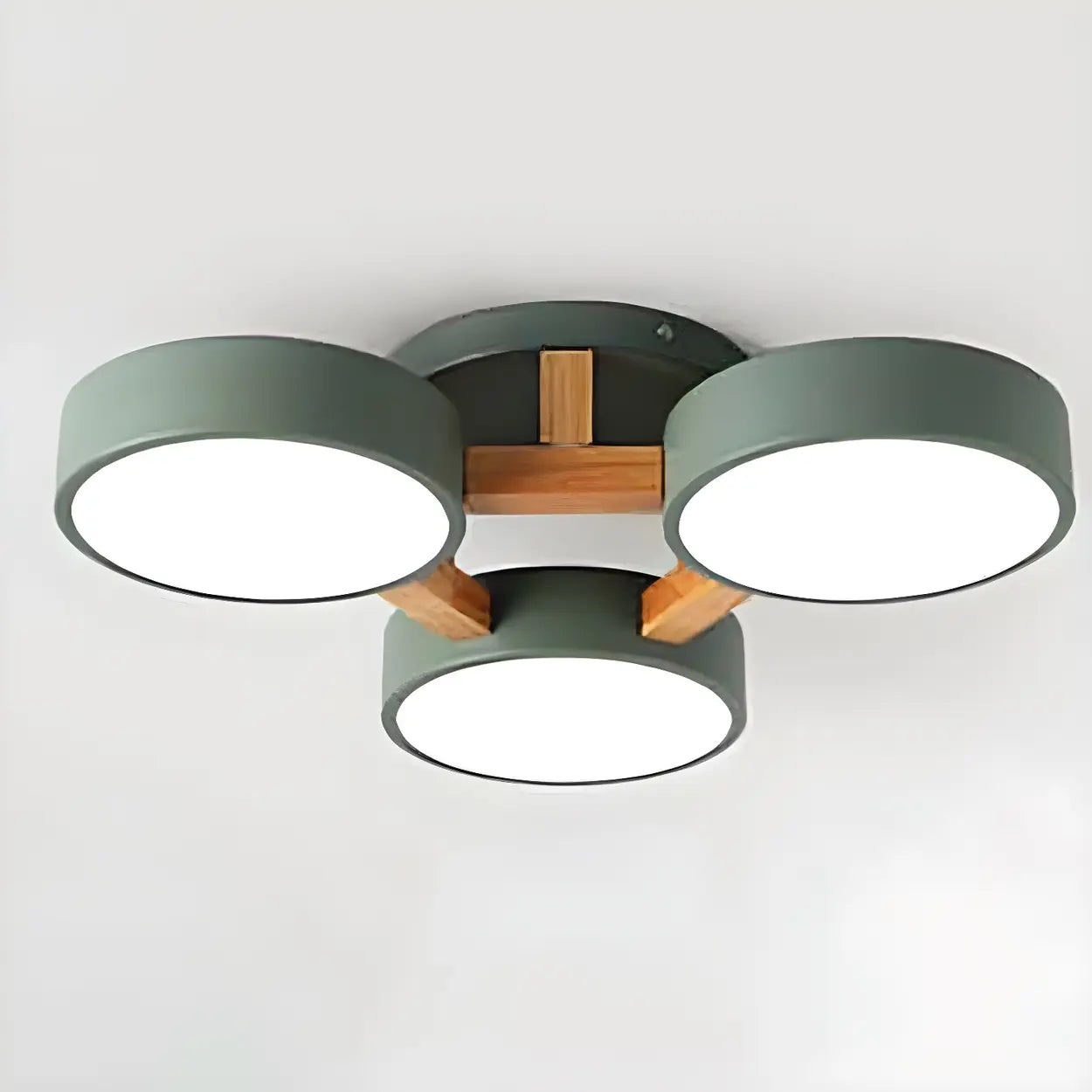 Green ceiling light with three round shades and wood details.