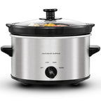 Silver slow cooker with glass lid and manual heat dial