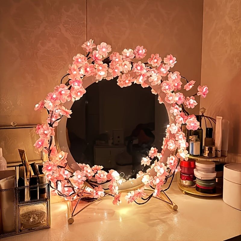 Blossom lights wrapped around a dressing table mirror