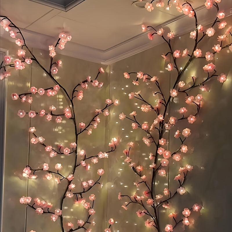 Illuminated pink cherry blossom lights viewed close up