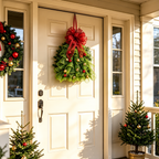 Green mesh Christmas tree hanging wreath displayed on a front door