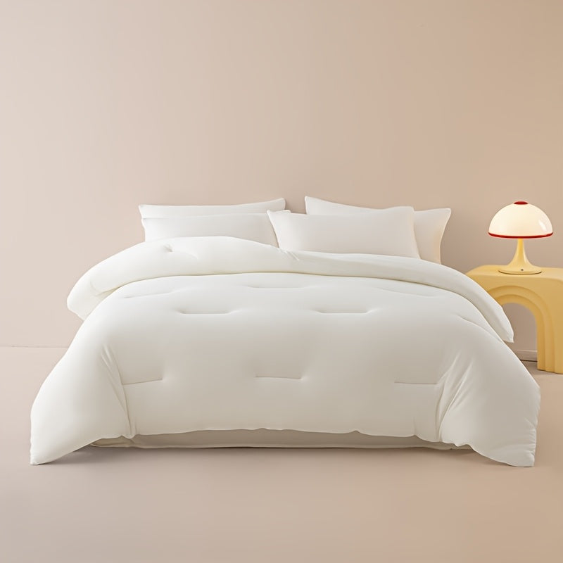White cloud comforter in a neutral bedroom