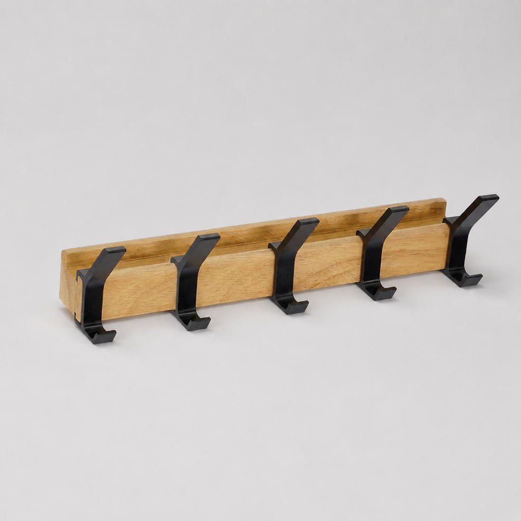 Five-hook black and wood coat rack isolated on a light gray background.