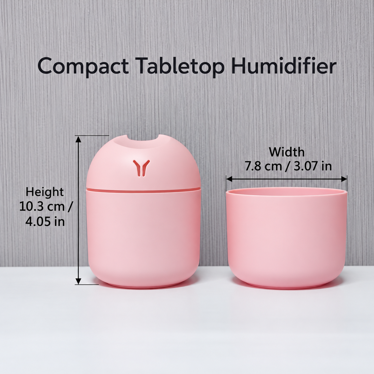 Pink humidifier and open reservoir with width and height measurements