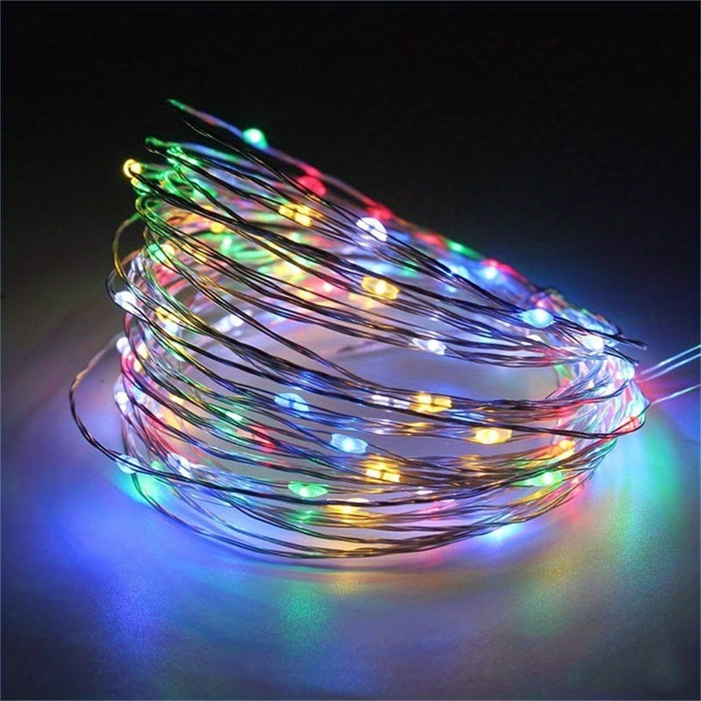 Copper fairy lights form a glowing multicolor coil.