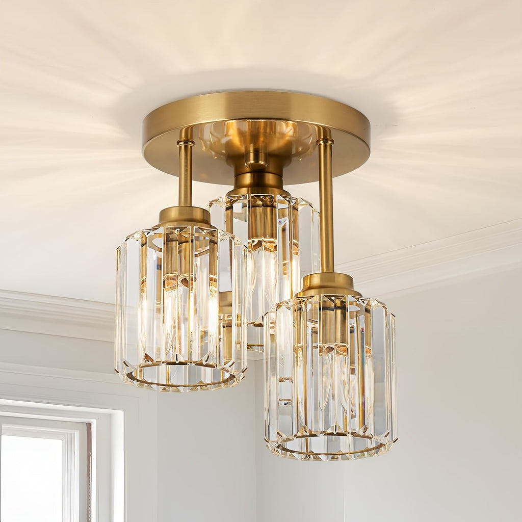 Gold three shade crystal ceiling light with staggered cylindrical shades